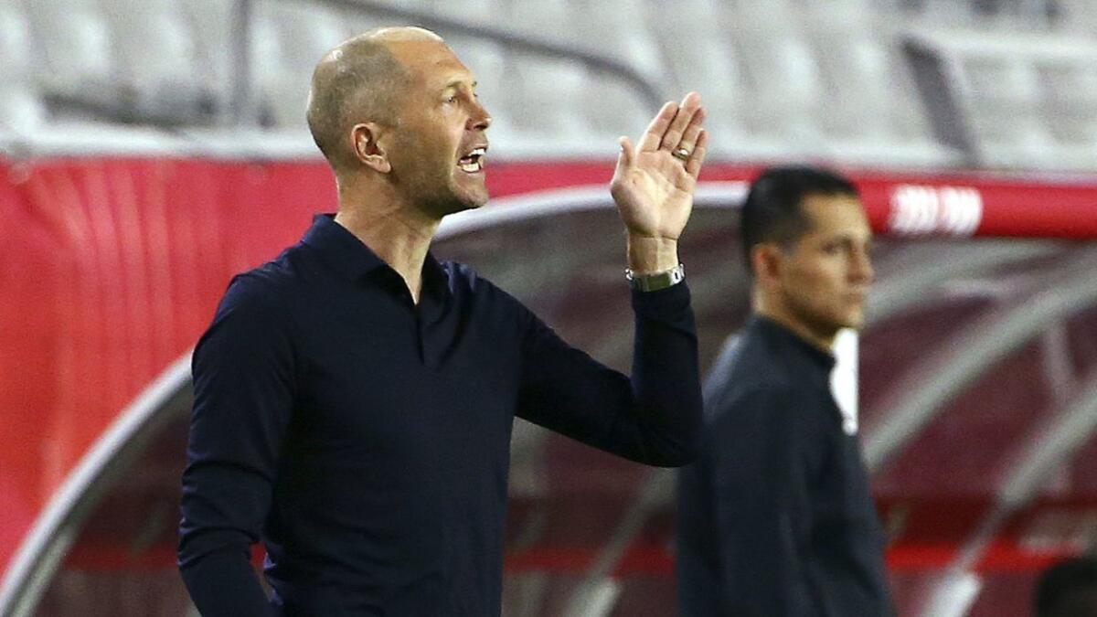 U.S. men's soccer coach Gregg Berhalter instructs his players during the first half of a game against Panama on Jan. 27.