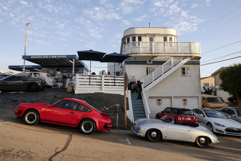 A side view of the "Boat House" at 1009 South Coast Highway in the village district of Laguna Beach, which is now an automotive business.