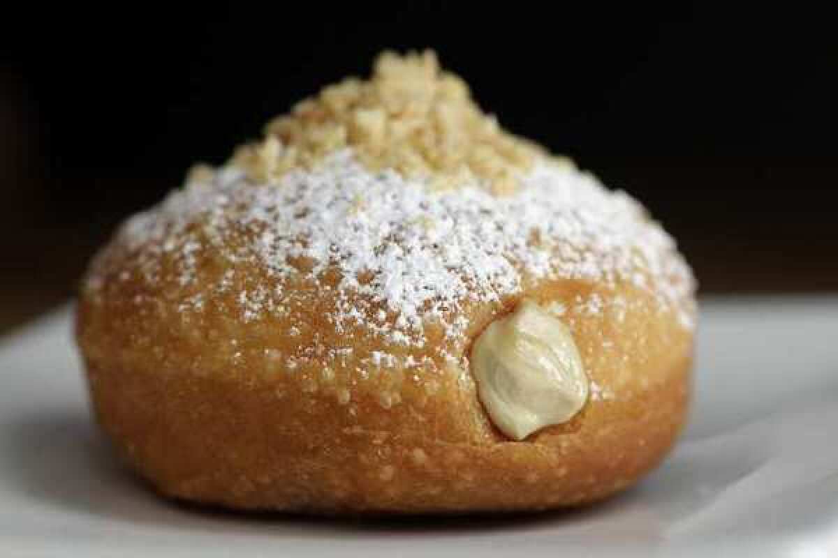 The foie gras and jelly doughnut from Umamicatessen. National Donut Day celebrates a dessert that is highly lucrative.