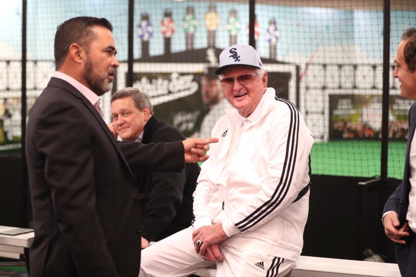 FormerWhite Sox player and manager Ozzie Guillen and former broadcaster Ken "Hawk" Harrelson share a moment at SoxFest on Jan. 25, 2019, at the Hilton Chicago.