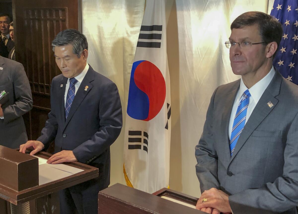 U.S. Defense Secretary Mark Esper, right, and his South Korean counterpart, Jeong Kyeong-doo, in Bangkok 