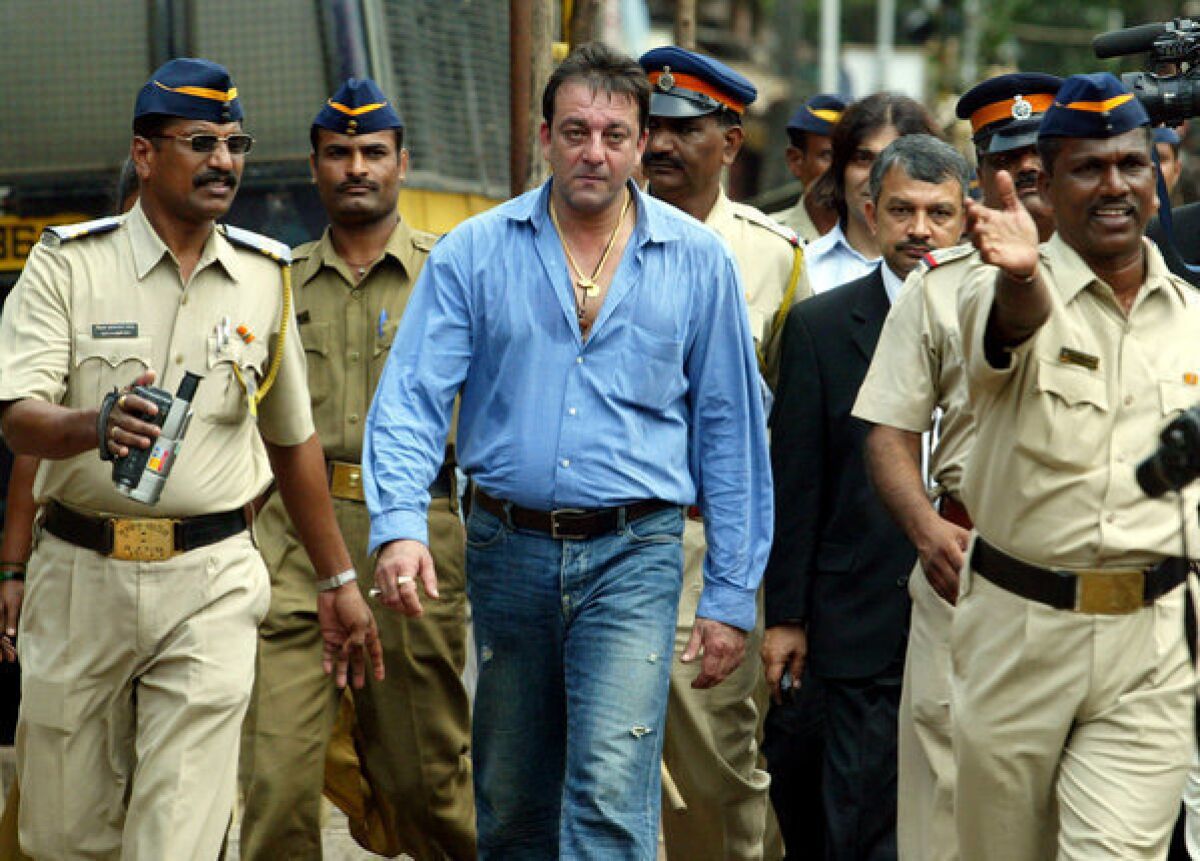 In this Sept. 12, 2006, file photo, Bollywood actor Sanjay Dutt leaves a special court trying the cases of those accused in the 1993 Mumbai bombings in India.