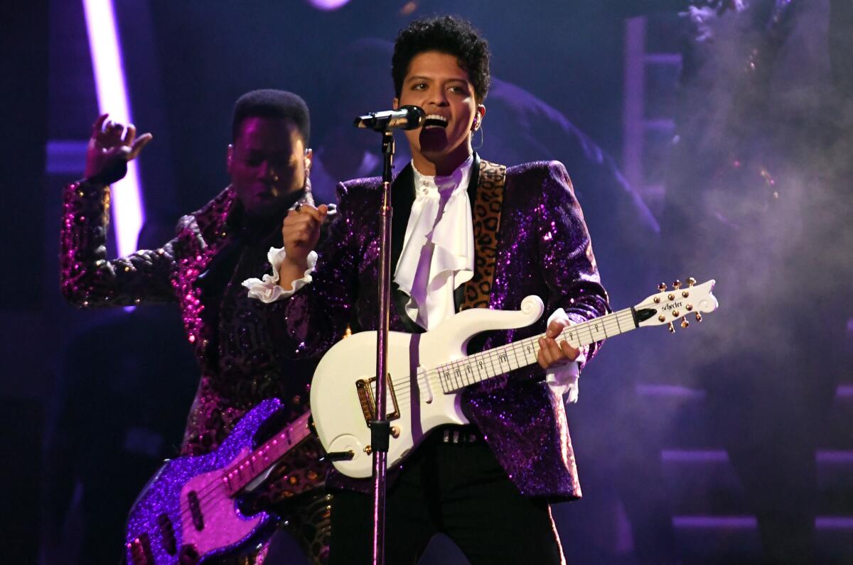 Bruno Mars performs a tribute to Prince during the 59th Grammy Awards at Staples Center in Los Angeles.