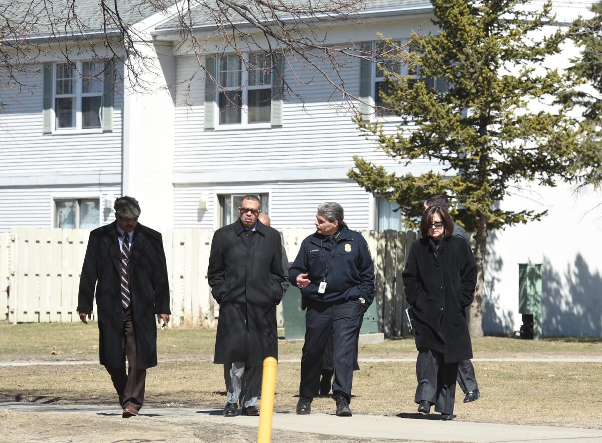 Detroit Police Chief James Craig and other law enforcement officials brief reporters on March 24 as authorities investigate the home where the bodies of two children were found in a freezer.