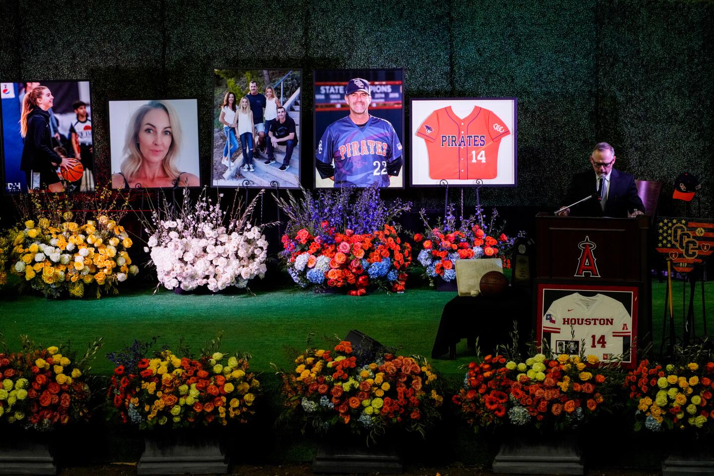 Erik Rees, family friend and Pastor of the Altobelli family speaks during a celebration of life ceremony at Angel Stadium on Monday to honor the lives of John, Keri and Alyssa Altobelli.