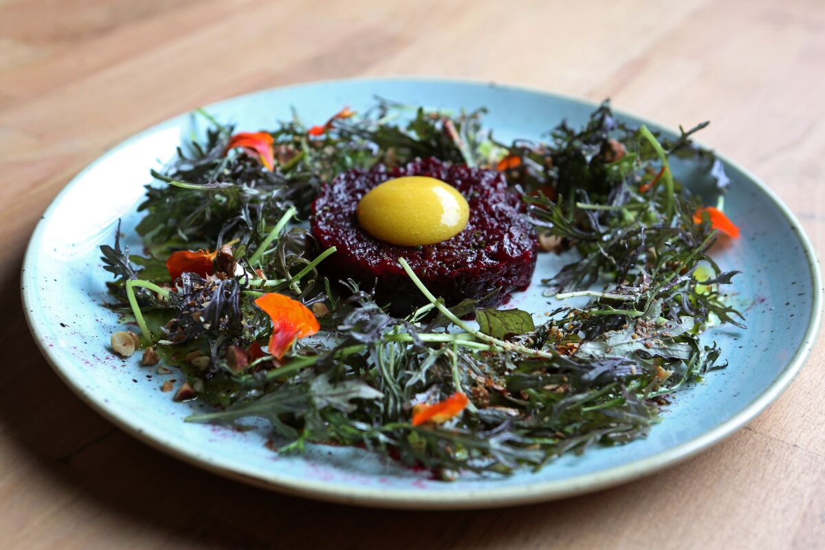 The beet tartar with mustard greens, almond and preserved lemon at Kali Restaurant.