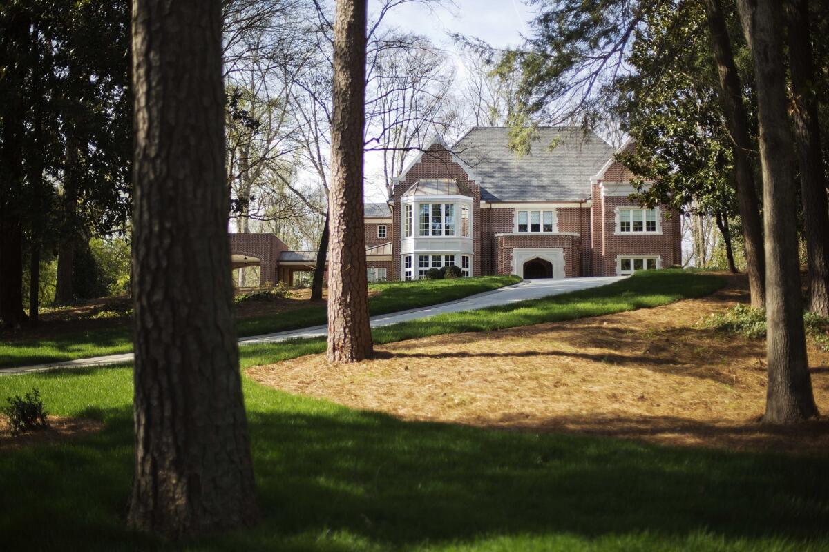 The $2.2-million residence of Atlanta Archbishop Wilton Gregory stands in the upscale Buckhead neighborhood in Atlanta. Gregory apologized for his spending and said the home would be sold.