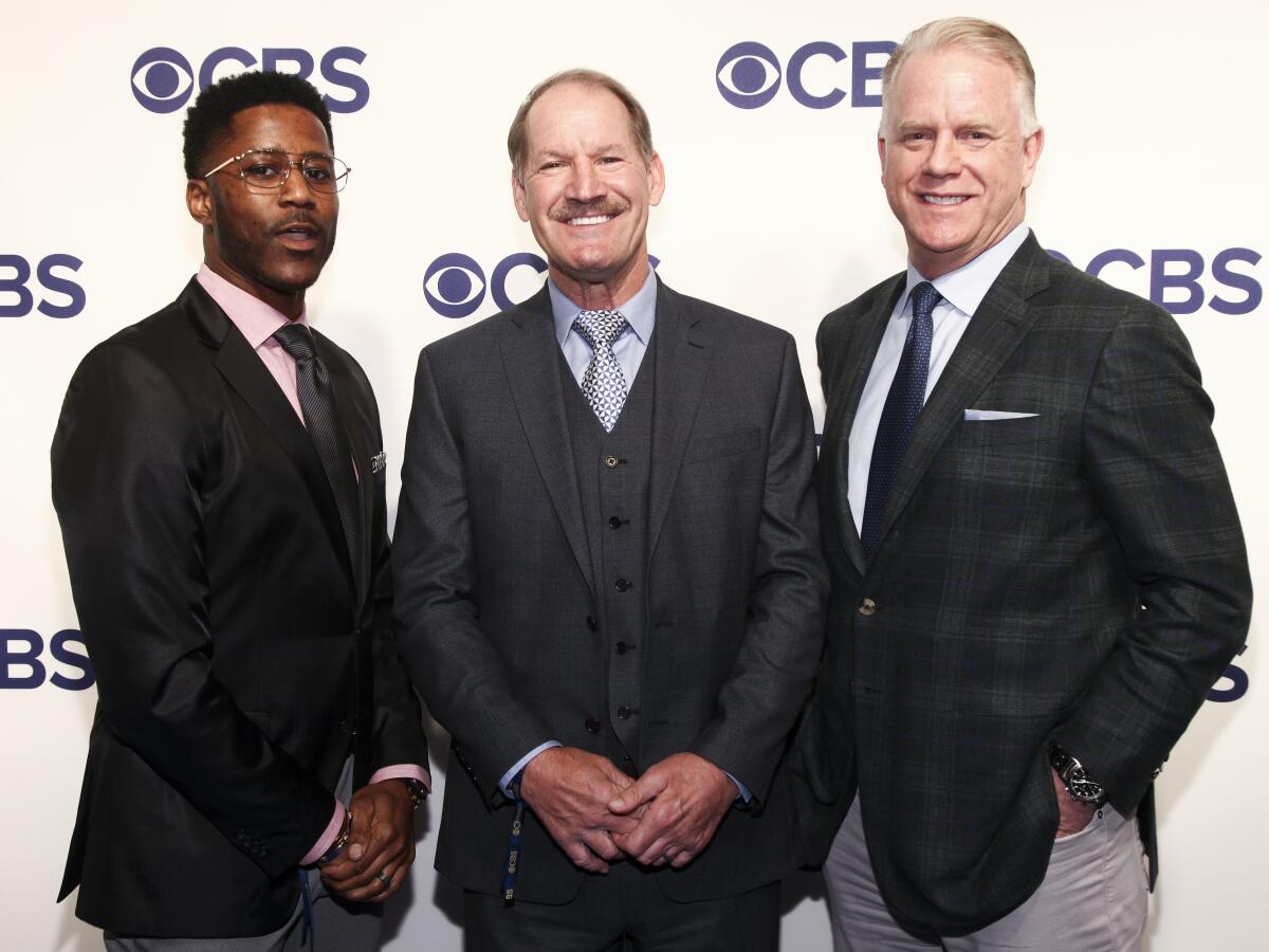 Nate Burleson, from left, Bill Cowher and Boomer Esiason attend the CBS Network 2018 Upfront in 2018