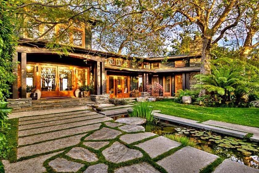 This modern Craftsman in the Beverly Hills Post Office area is listed at $9,995,000.