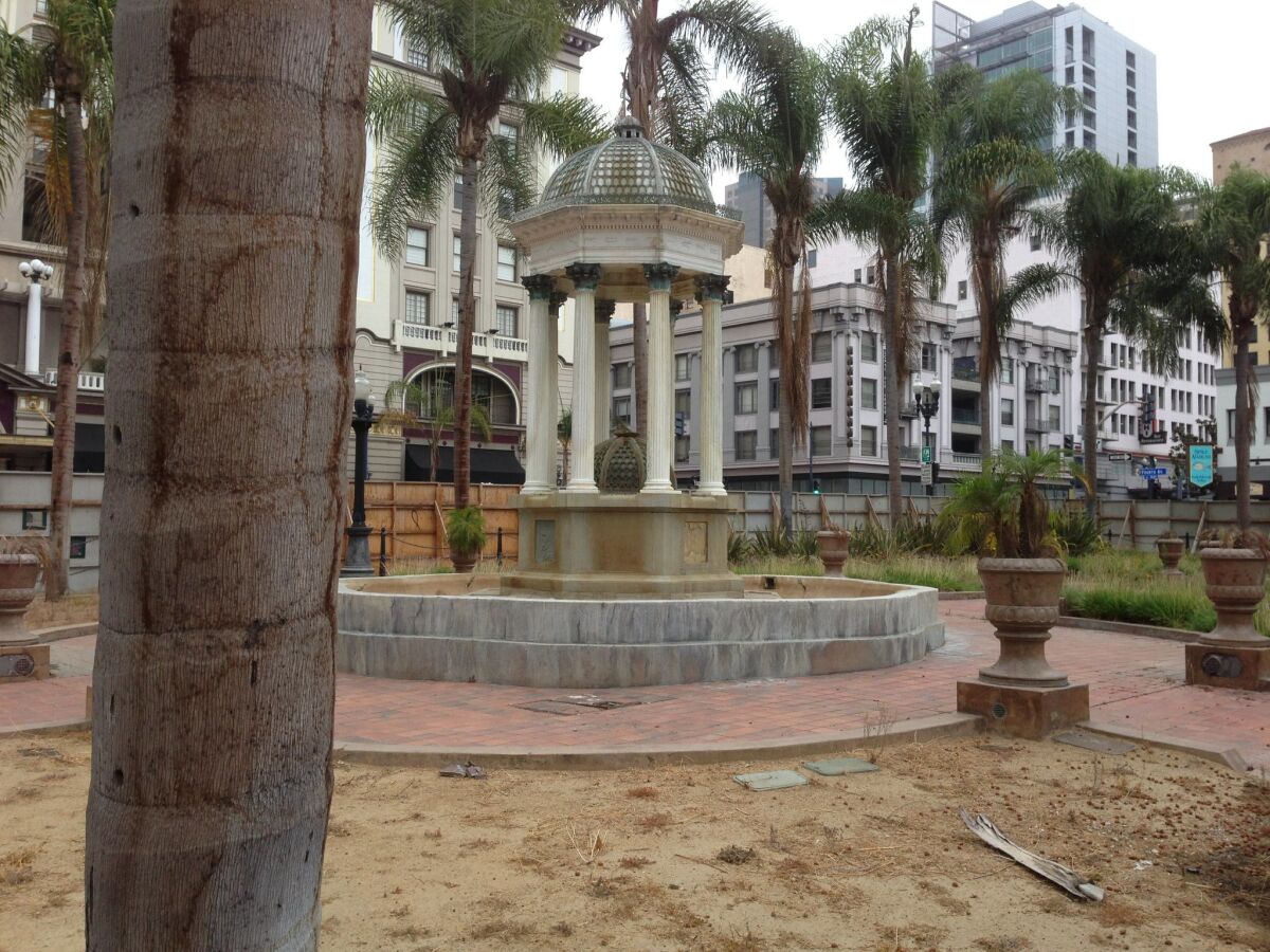 Horton Plaza and its fountain await restoration as part of a expansion of the park just north of Horton Plaza shopping center. A plaque on the fountain in Horton's honor has been temporarily removed to deter vandalism. - Roger Showley