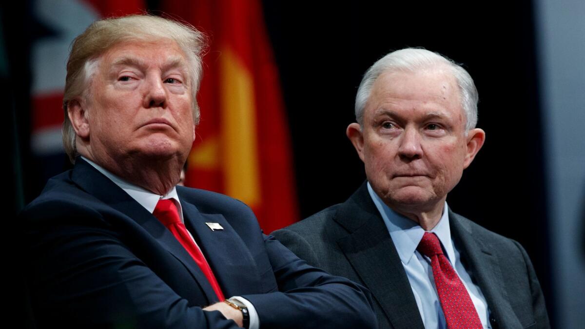 Atty. Gen. Jeff Sessions, right, spoke last week with the special counsel's office, which is investigating whether anyone from President Trump's team assisted Russian interference in the 2016 campaign.