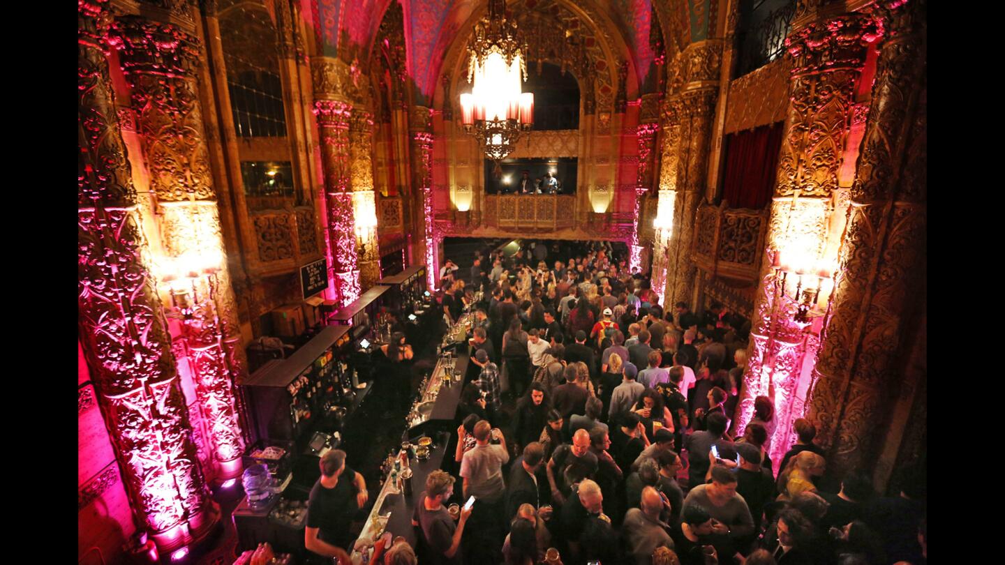 Attendees pack the Theatre at Ace Hotel for David Lynch's Festival of Disruption on Saturday. The event featured music from Robert Plant and St. Vincent along with an array of talks and film screenings.