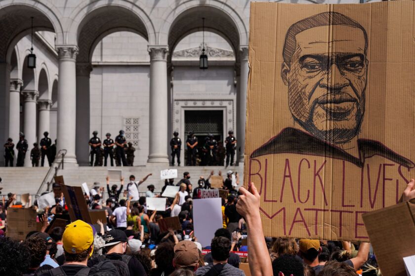 Protesters outside City Hall in Los Angeles