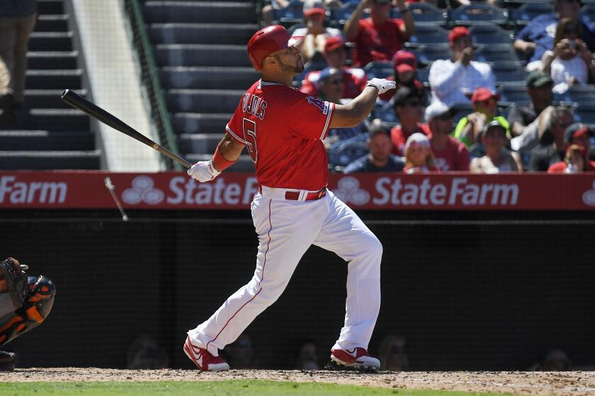 Los Angeles Angels' Albert Pujols watches his two-run home run during the sixth inning of a baseball game against the Baltimore Orioles, Sunday, July 28, 2019, in Anaheim, Calif. (AP Photo/Mark J. Terrill)