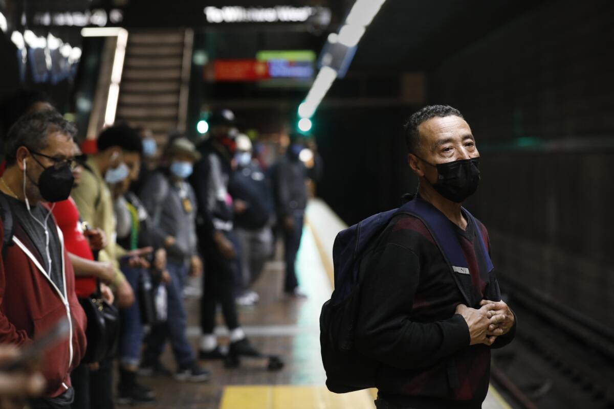 Los Angeles County Metro commuters wait at the station in downtown L.A.