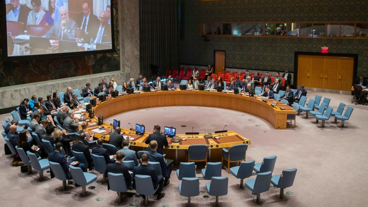 United Nations special envoy to Syria Staffan de Mistura is seen on a video screen as he listens to a Security Council meeting on Syria at U.N. headquarters Tuesday.