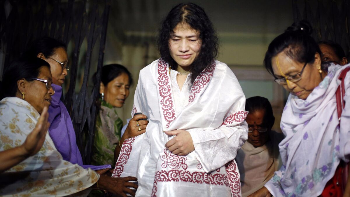 Indian rights activist Irom Sharmila is greeted by her supporters in 2014 in Imphal, the capital of Manipur state.