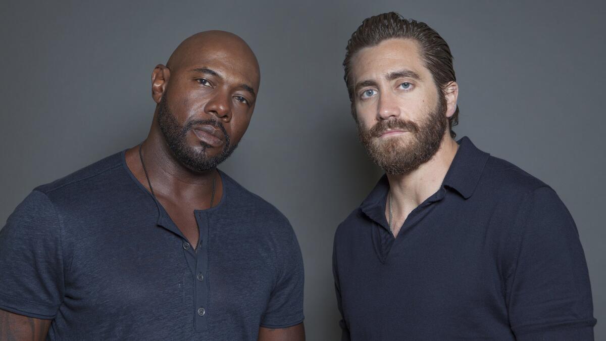 Antoine Fuqua, left, and Jake Gyllenhaal pose for a portrait at the Four Seasons Hotel in Los Angeles.