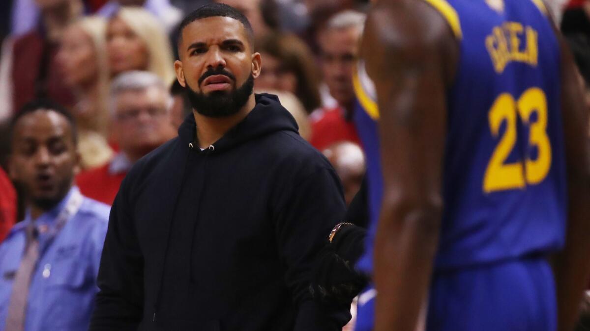 Drake reacts during Game 2 of the NBA Finals between the Golden State Warriors and the Toronto Raptors on June 2 at Scotiabank Arena.