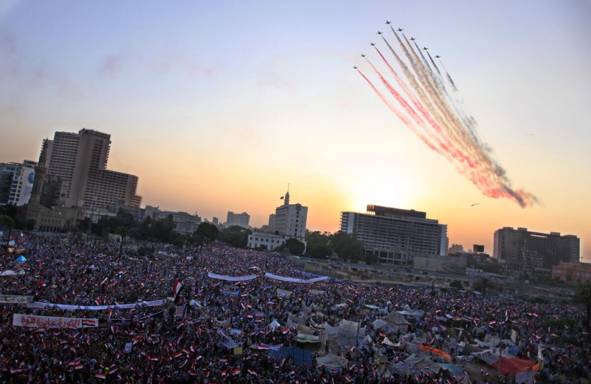 Egyptian air force jets put on a show Sunday as opponents of Egypt's ousted President Mohammed Morsi rallied in Cairo's Tahrir Square.