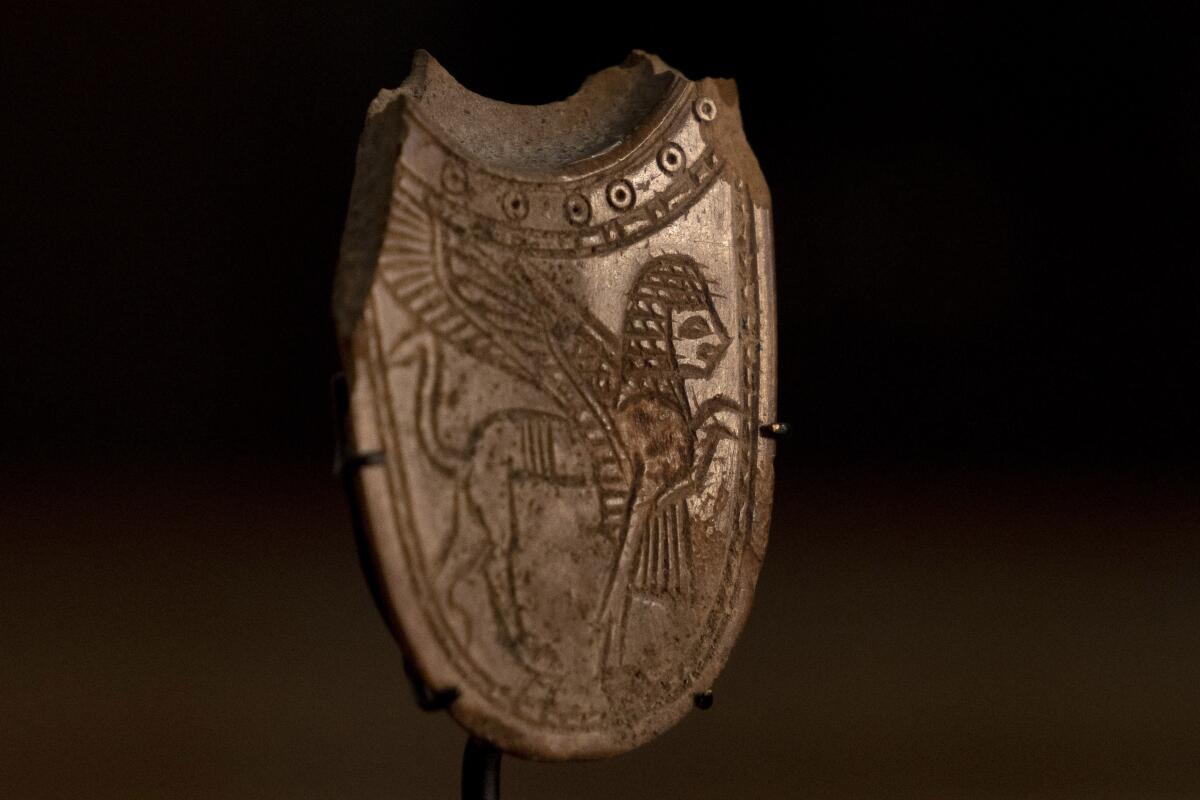 A 2,700-year-old ivory incense spoon