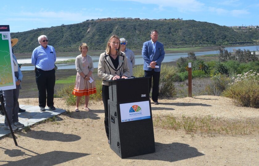 Encinitas Deputy Mayor Catherine Blakespear talks about the importance of open space during an April 7 press conference announcing the acquisition of Batiquitos Bluffs.