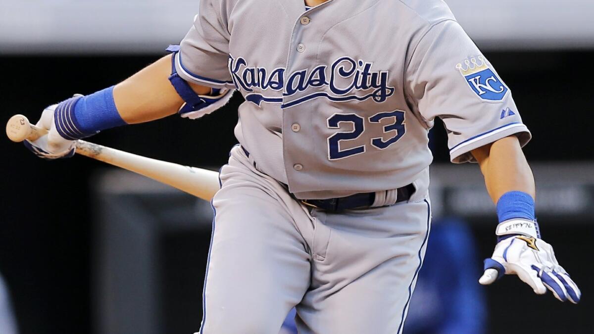 Kansas City Royals second baseman Omar Infante turns a double play