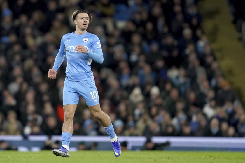 Manchester City's Jack Grealish reacts during the English Premier League soccer match between Manchester City and Brentford at the City of Manchester Stadium in Manchester, England, Wednesday, Feb. 9, 2022. (AP Photo/Jon Super)