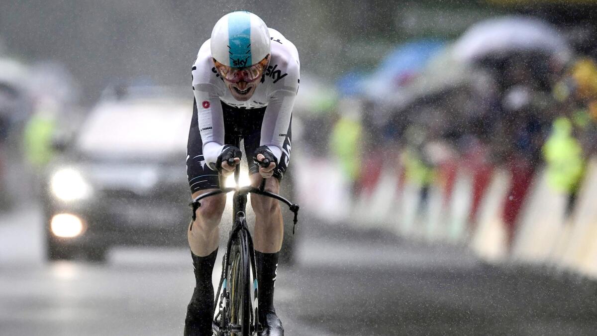 Geraint Thomas heads to the finish line during the Tour de France's opening stage, individual time trial, on Saturday.