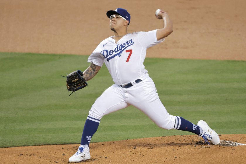 LOS ANGELES, CALIFORNIA - APRIL 26: Julio Urias #7 of the Los Angeles Dodgers pitches against the Cincinnati Reds.