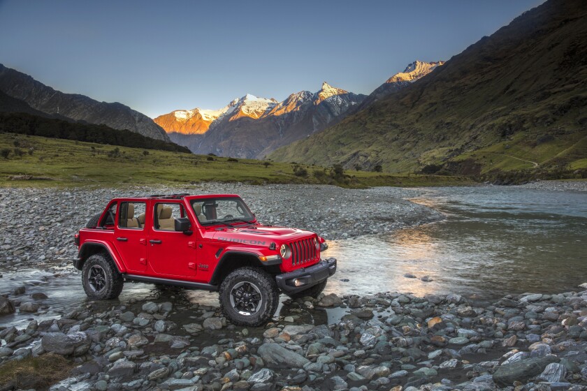 This photo provided by Stellantis North America shows the 2021 Jeep Wrangler Rubicon Unlimited. Available in two-door or four-door configurations and with a number of capable trim levels, the Jeep Wrangler is one of the most off-road focused vehicles you can buy today. (Courtesy of Stellantis North America via AP)
