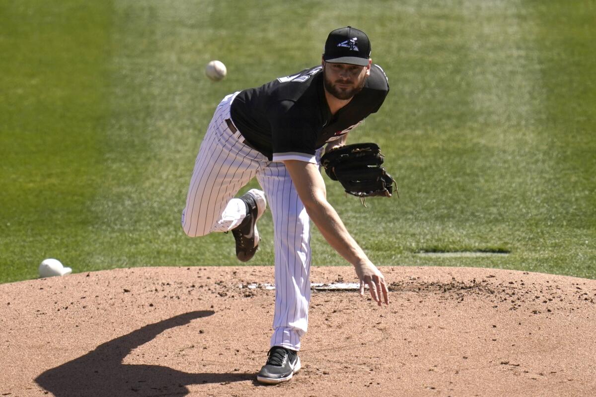 Chicago White Sox's Lucas Giolito pitches during a spring training game.