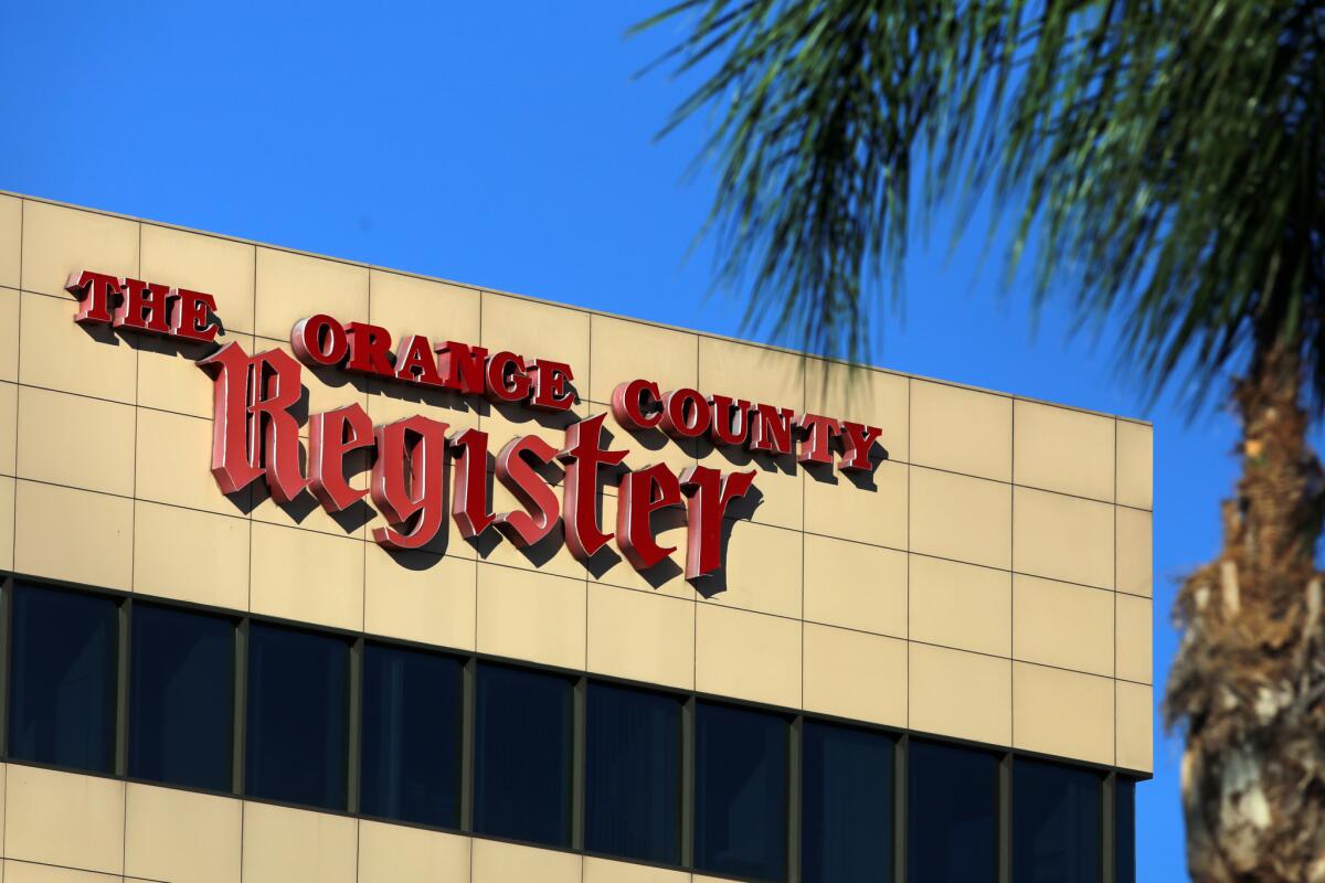 The Orange County Register building in Santa Ana. The paper's parent, Freedom Communications, will be sold to Digital First Media.