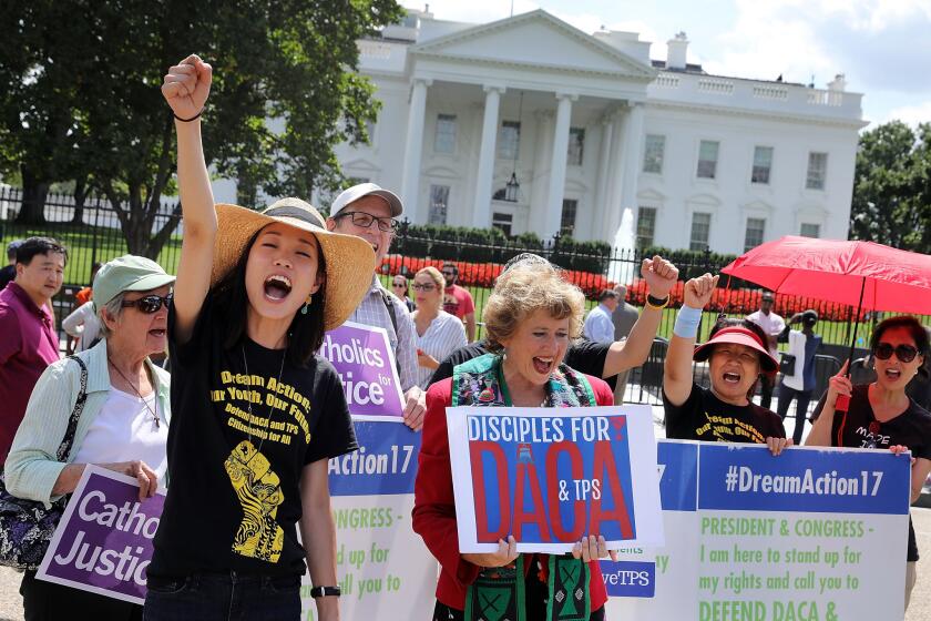 WASHINGTON, DC - AUGUST 30: Serafina Ha (L) of Chicago and Disciples of Christ Refugee and Immigration Ministries Director Sharon Stanley-Rea lead chants during a demonstration in favor of immigration reform in front of the White House August 30, 2017 in Washington, DC. Organized by The Franciscan Action Network, Disciples Refugee & Immigration Ministries, Church World Service and Sisters of Mercy and the National Korean American Service & Education Consortium, the rally began seven days of prayer and fasting to demand the Trump Administration protect Deferred Action for Childhood Arrivals (DACA) and Temporary Protection Status (TPS). (Photo by Chip Somodevilla/Getty Images) ** OUTS - ELSENT, FPG, CM - OUTS * NM, PH, VA if sourced by CT, LA or MoD **