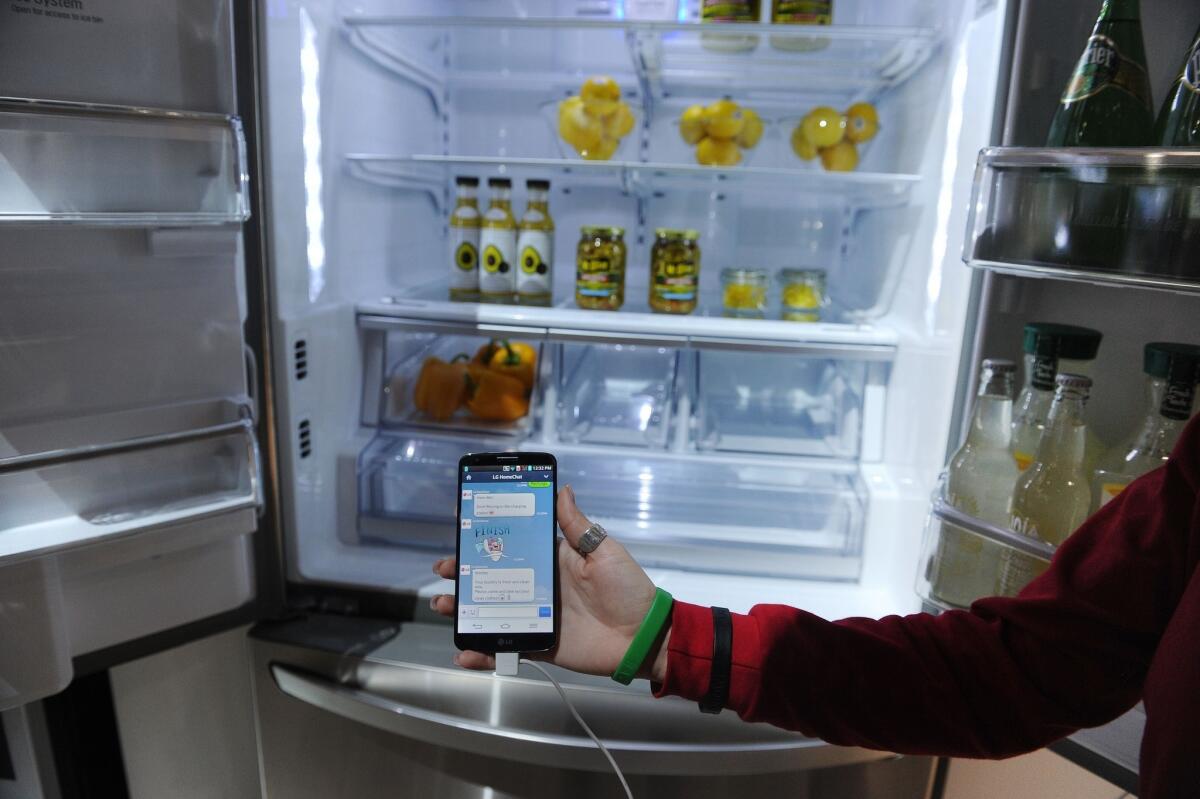 Hackers used a refrigerator in a recent cyber attack. Shown here is a "smart" fridge that connects to the Internet, displayed at International CES, a consumer electronics show in Las Vegas.