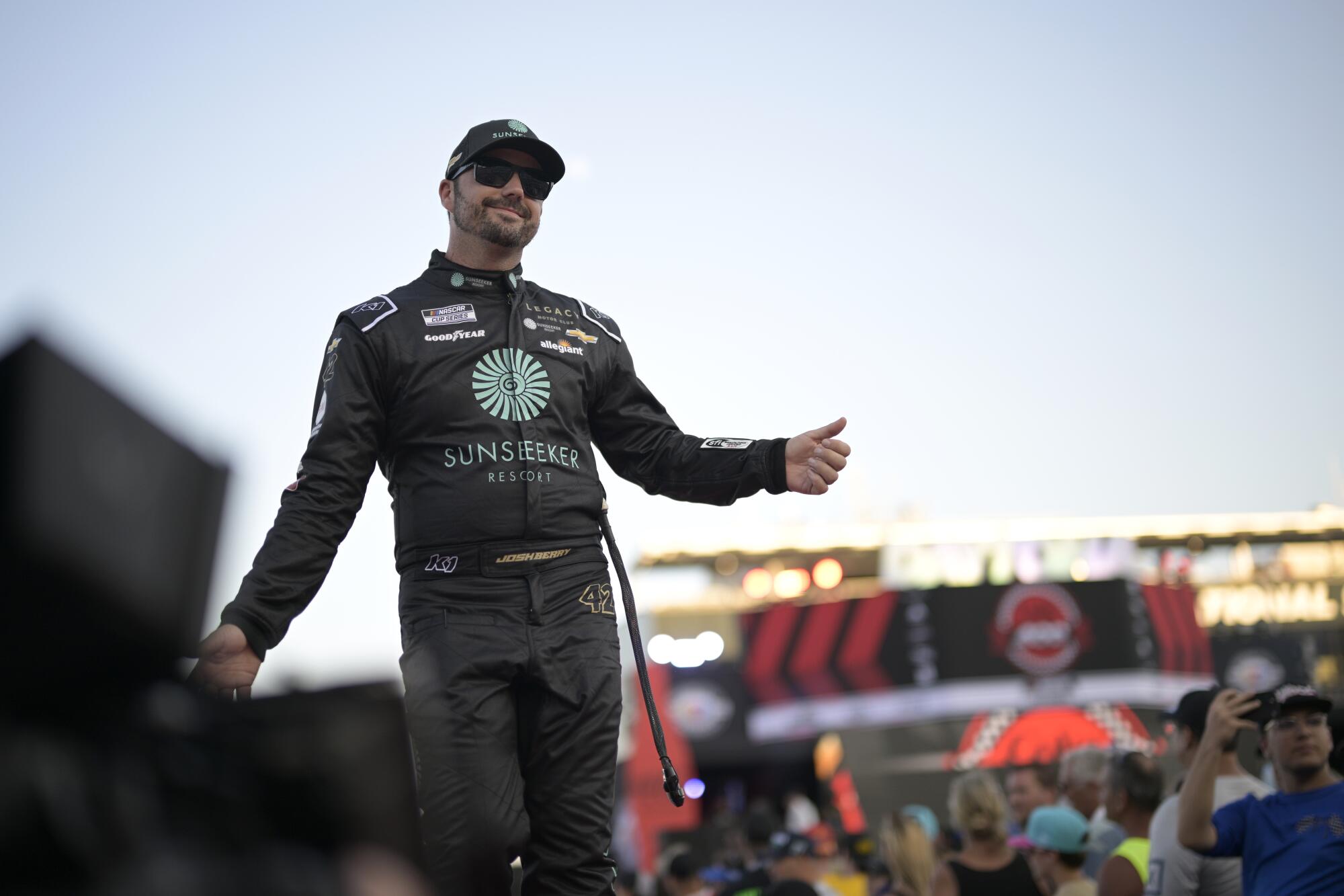 Josh Berry walks on the track at Daytona International Speedway during driver introductions before a Cup Series race in 2023.