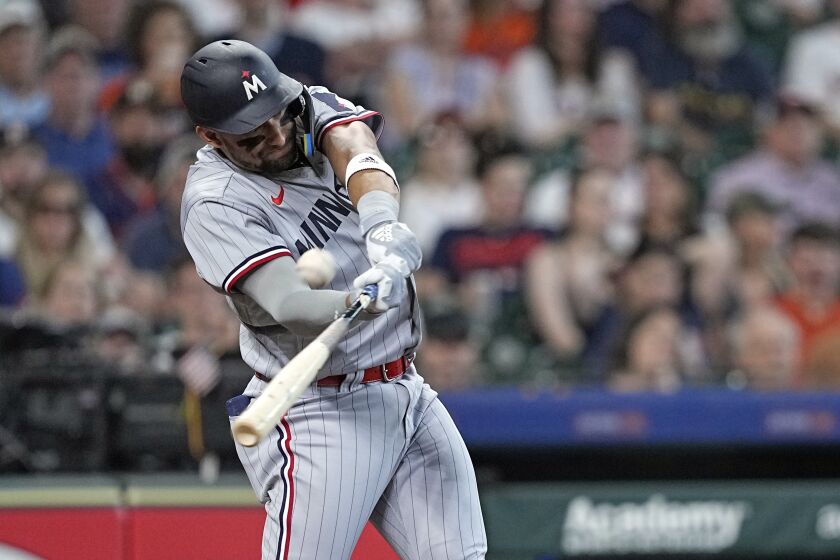 Minnesota Twins' Royce Lewis hits a three-run home run against the Houston Astros during the third inning of a baseball game Monday, May 29, 2023, in Houston. (AP Photo/David J. Phillip)