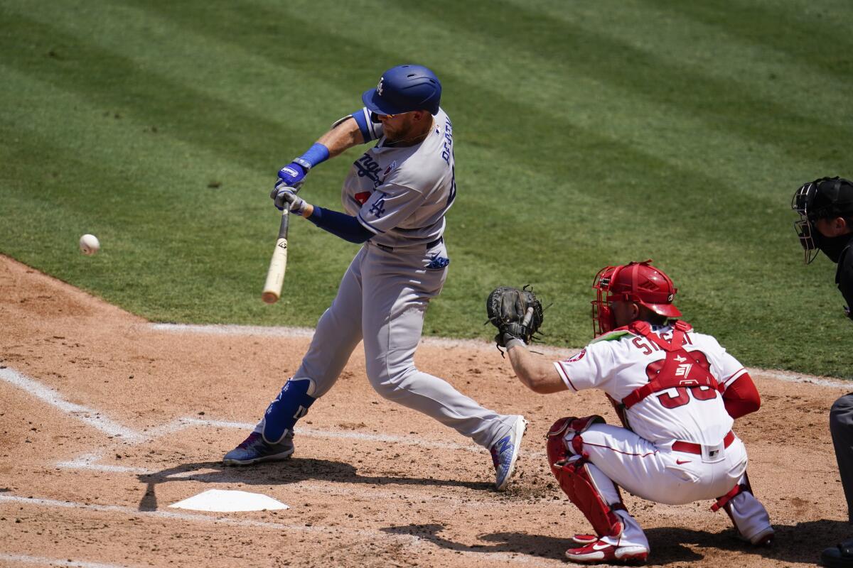 Dodgers first baseman Matt Beaty hits against the Angels.