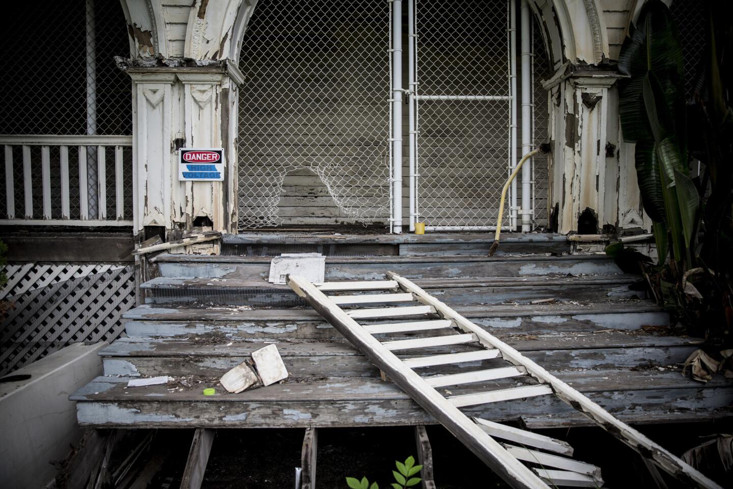 Squatters have crawled through a chain link into the abandoned chapel at the West Los Angeles Veterans Affairs campus.