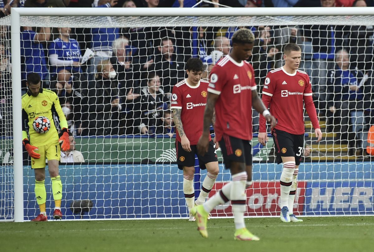 Manchester United players react after Leicester's Patson Daka scored his side's fourth goal during the English Premier League soccer match between Leicester City and Manchester United at King Power stadium in Leicester, England, Saturday, Oct. 16, 2021. (AP Photo/Rui Vieira)