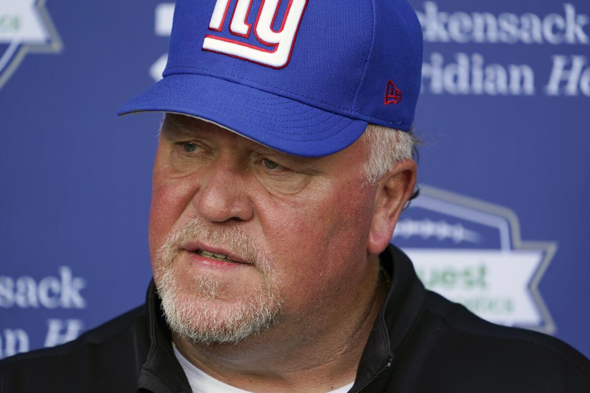 FILE - New York Giants' defensive coordinator Wink Martindale talks to reporters before a practice at the NFL football team's training facility in East Rutherford, N.J., Thursday, May 26, 2022. Martindale had few regrets after being fired by long-time friend John Harbaugh after a decade with the Ravens in Baltimore, the last four as their defensive coordinator. The Giants play the Ravens on Sunday, Oct. 16, at MetLife Stadium.(AP Photo/Seth Wenig, File)