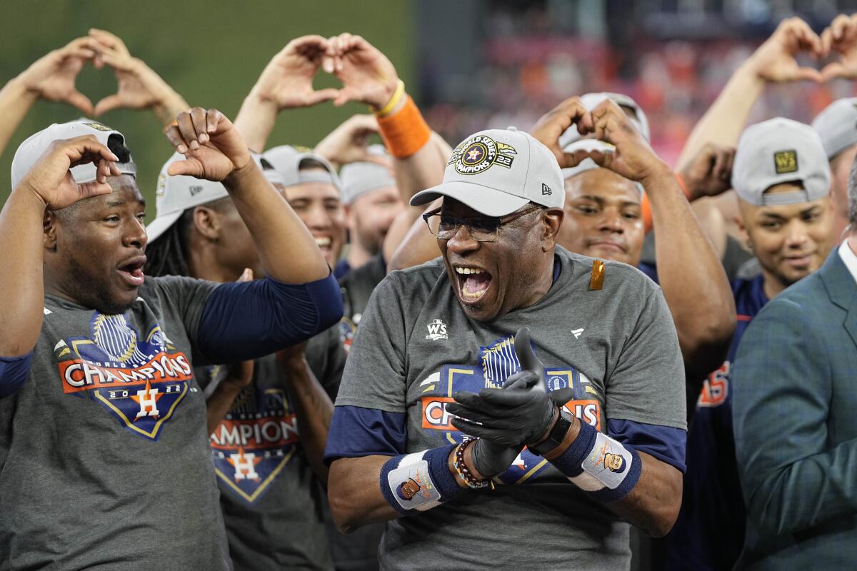 Houston Astros manager Dusty Baker Jr. celebrates after winning the first World Series title of his storied baseball career.