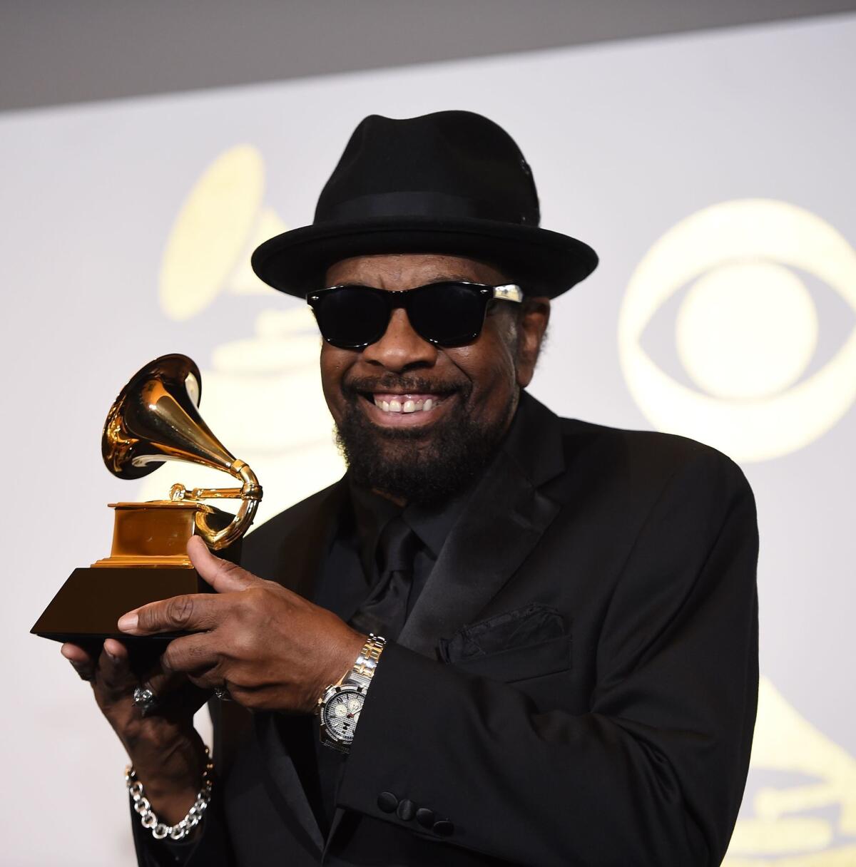 William Bell holding his first Grammy.