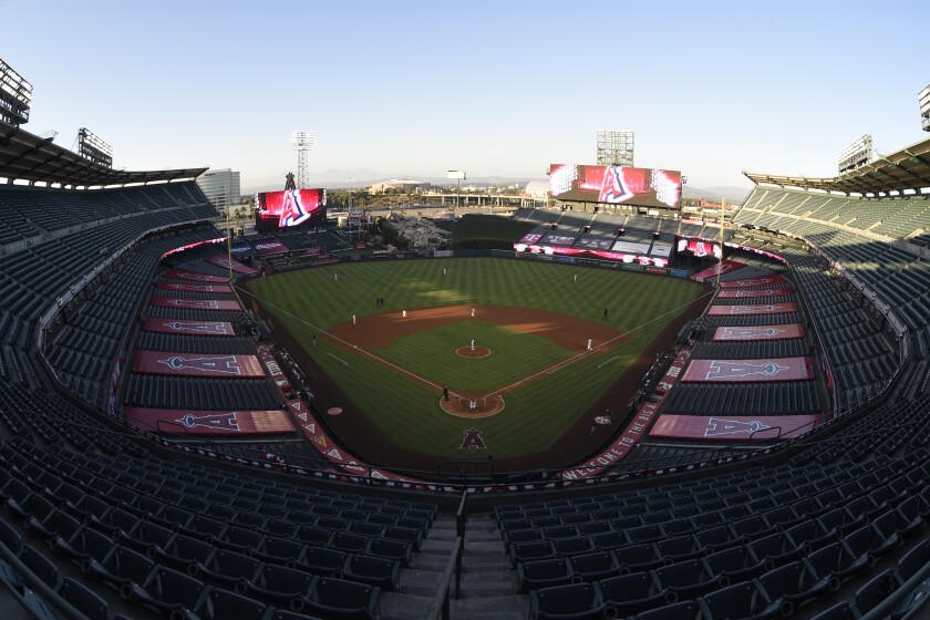 An overall view of Angel Stadium of Anaheim in the third inning of a baseball game during the pandemic.