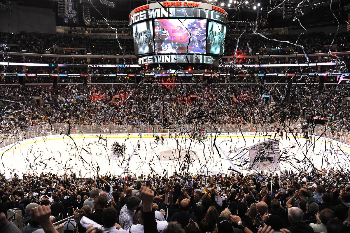 Kings players and fans celebrate after a win over the New York Rangers in the 2014 Stanley Cup Final at Staples Center.