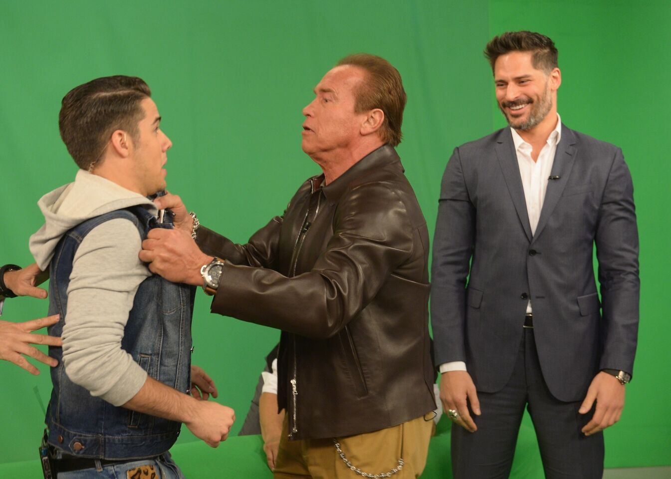 Arnold Schwarzenegger performs on the set of "Despierta America" with Joe Manganiello at Univision Headquarters in Miami.