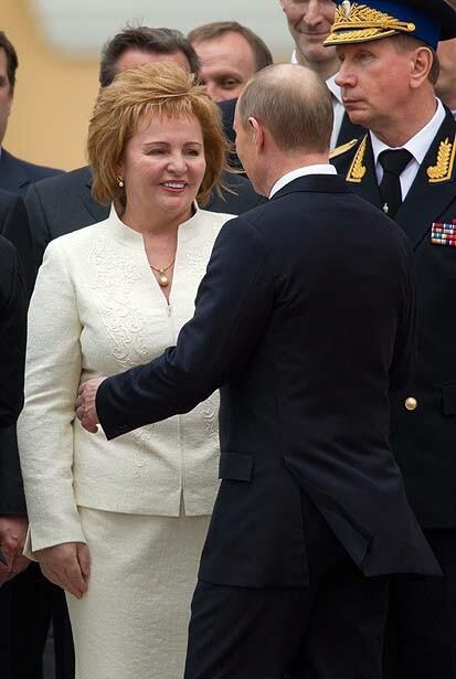 Russian President Vladimir Putin greets his wife, Lyudmila, during an inauguration ceremony at the Cathedral Square in the Kremlin in Moscow on May 7, 2012.