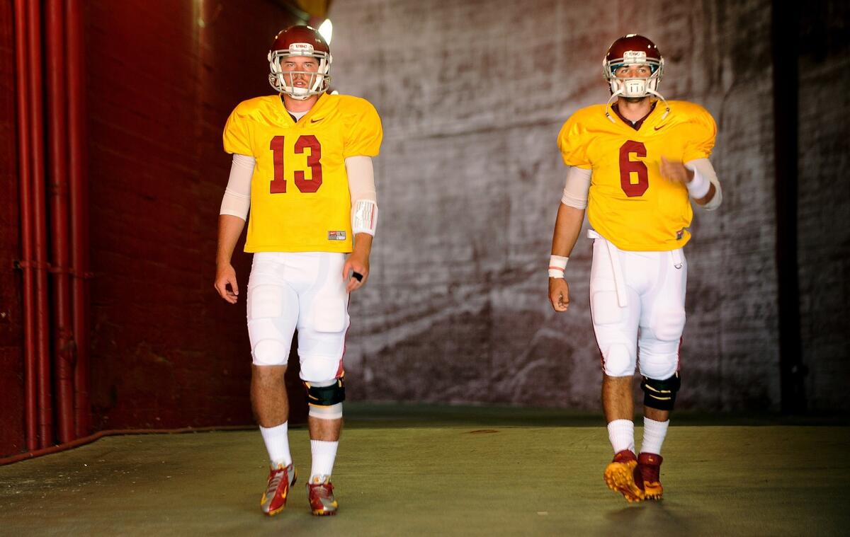 Could Max Wittek, left, and Cody Kessler each see time under center when USC opens its season against Hawaii on Aug. 29?