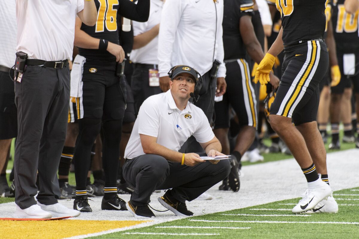 Missouri head coach Eliah Drinkwitz watches from the sideline during the fourth quarter of an NCAA college football game against North Texas, Saturday, Oct. 9, 2021, in Columbia, Mo. (AP Photo/L.G. Patterson)