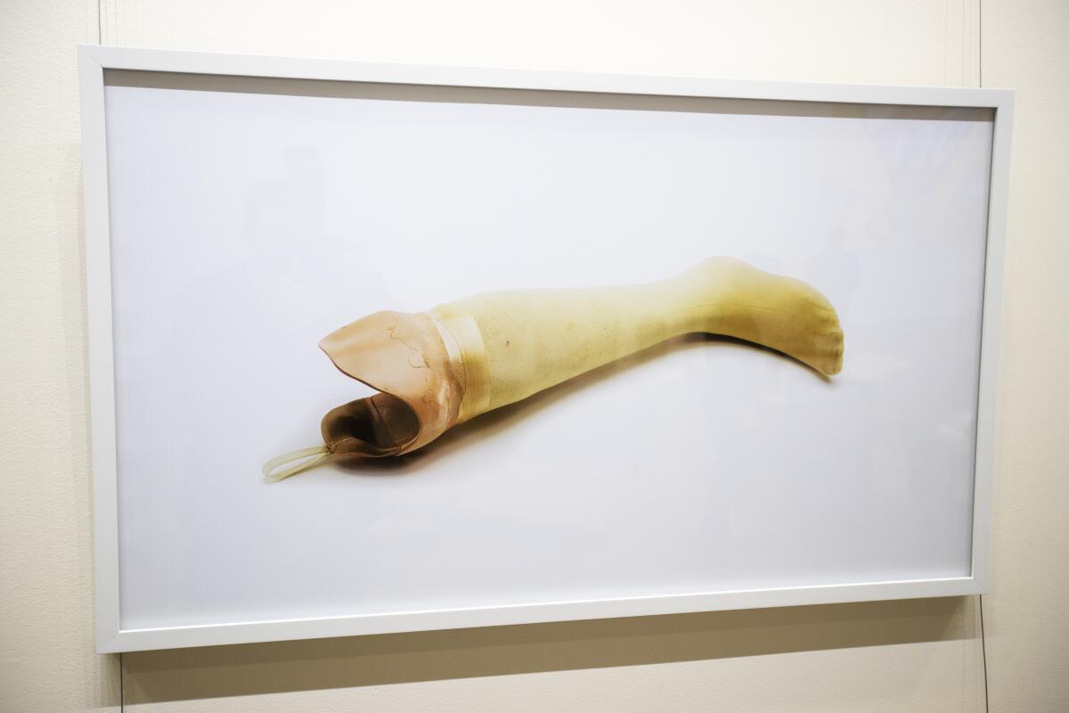 A piece called "Daddy's Leg" is part of "Saved: Objects of the Dead," an exhibit of things people kept after their loved ones had died.